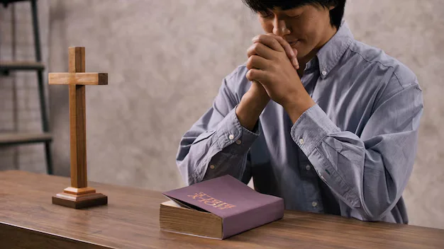 Believer praying while trusting God’s timing